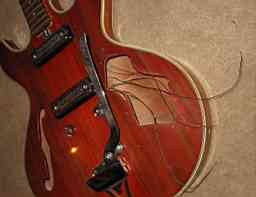 Teisco Barney Kessel tulip-style mahogany body, cavity.jpg